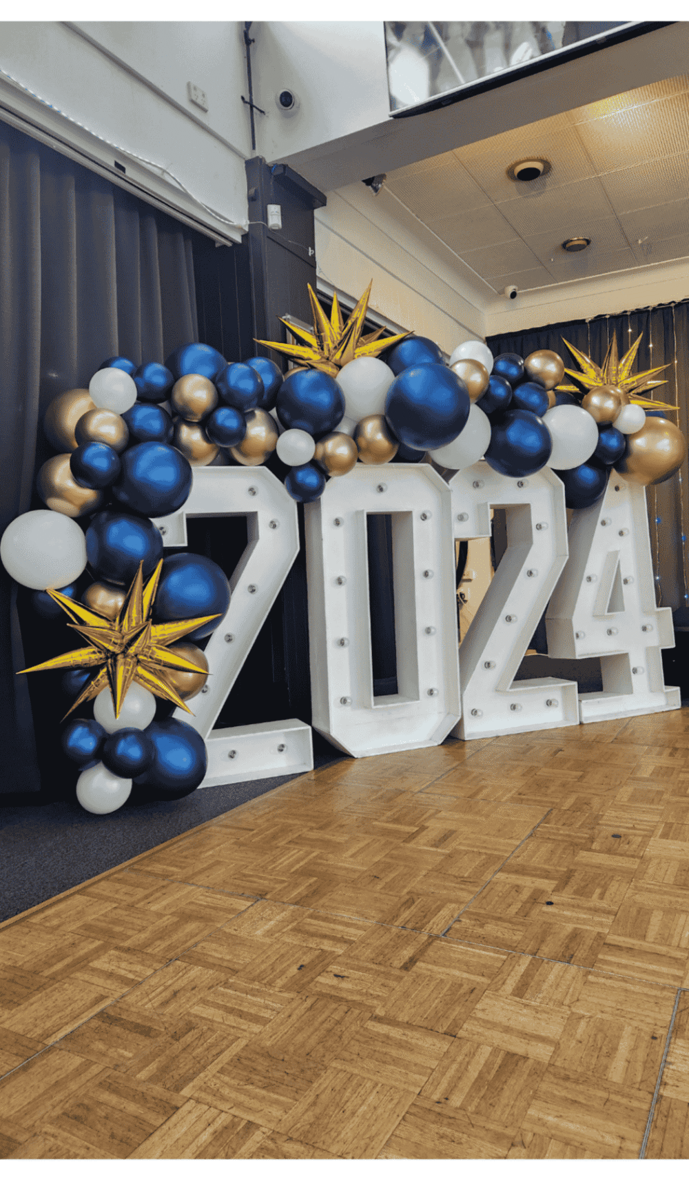 medium organic garland light up numbers foil starbursts balloons